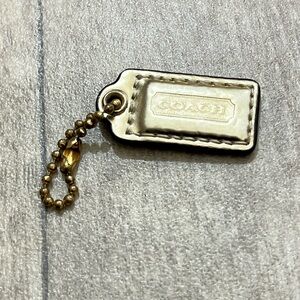 Coach Gold hang tag
